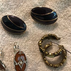 Three pairs of pierced earrings